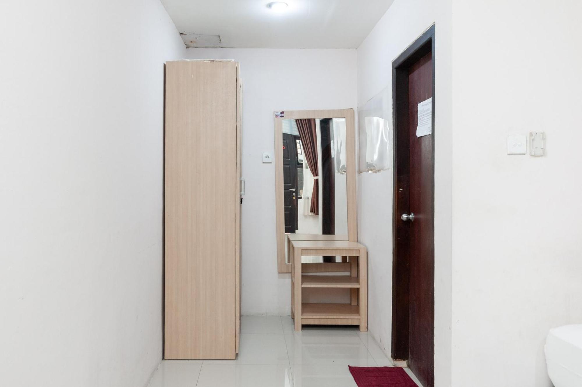 Hotel Reddoorz Syariah Near Convention Hall
